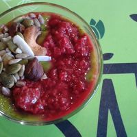 Smoothiebowl with mango, spinach, raspberry, coconut, hazelnut and almond milk. at Satori in Malmo