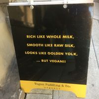 Signage at Sai Plant Deli by Vegan Pudding & Co. in Vancouver