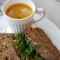 Vegan sandwich with a mug of spicey carrot soup at Kitch in Canterbury