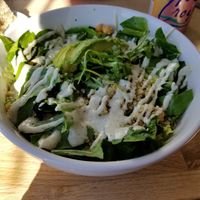 Protein bowl with greens at Southern Roots Filling Station in Jacksonville