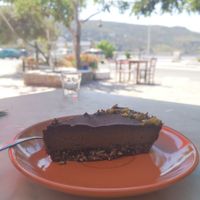 Chocolate cake pistachio almond carob at Andriakon in Andros