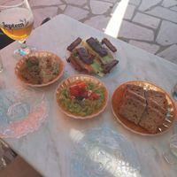 Hummus bread guacamole grilled soja  at Andriakon in Andros