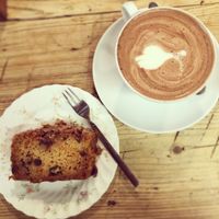 Walnut, carrot and raisin cake, with a hot chocolate!  at Offbeet in Wickham