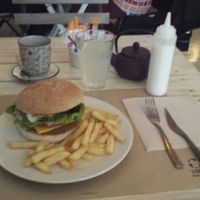 their quinoa burger + lemoniada which is always given +amazing garlic dressing at Punto Vegano in Madrid