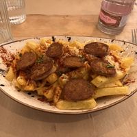 Salchipapas  at Punto Vegano in Madrid