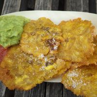 Crispy plantain chips with guacamole and tomato chilli dips at Latienda in Copenhagen