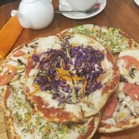 Trio de pizzas at Shakti en Chile in Santiago