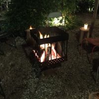 Have a drink at the fireplace at Lucifer in Garzon