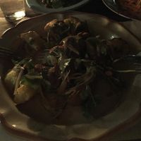 Vegan paradise. Potatoes boiled / baked with coriander / mustard sauce and smoked almonds with rucola. Yummy. at Lucifer in Garzon