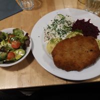 Schnitzel with mash and salad at Lokal Vegan Bistro in Warsaw