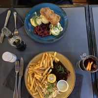 Ribs and the soy schnitzel with potatoes and beetroot  and mulled wine  at Lokal Vegan Bistro in Warsaw