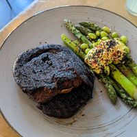 Seitan steak and asparagus at Lokal Vegan Bistro in Warsaw