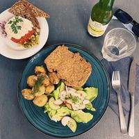 Tartar, soy cutlet with potatoes and fresh salad  at Lokal Vegan Bistro in Warsaw
