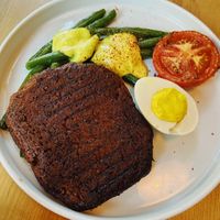 Vegan steak with vegan egg  at Lokal Vegan Bistro in Warsaw