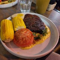 Seitan steak and non-alcoholic mojito at Lokal Vegan Bistro in Warsaw