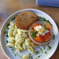 Dewolaj, gnocchi, surówka z marchewki z pistacjami at Lokal Vegan Bistro in Warsaw