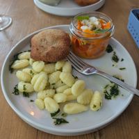 Seitan cutlet with gnocchi and carrot feta salad at Lokal Vegan Bistro in Warsaw