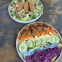 Tęczowe frytki i sałatka cezar at Lokal Vegan Bistro in Warsaw