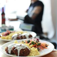 Baked beetroot-chickpea chop + millet with tomato sauce + salad with kale and leeks (GF) at Lokal Vegan Bistro in Warsaw