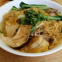 Fried wanton noodle soup with tofu and beans. Side of bean sprouts and mint which can be added at Tan Duy Linh in Cabramatta