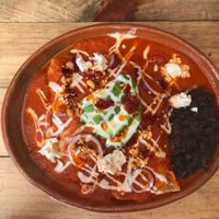Enchiladas suizas con queso de papa for breakfast. 👍 at La Colmena in San Andres Cholula
