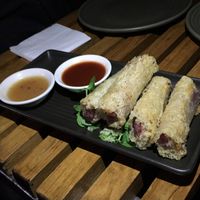 Sweet potato & yam rolls in rice noodle pastry net. at Bodhi in Sydney