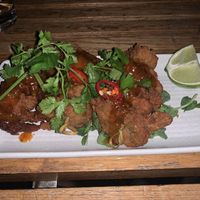 Chicken skewers with coriander and chilli  at Bodhi in Sydney
