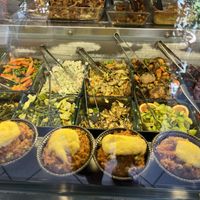 Some of the many amazing dishes - vegan lasagne and quiche in the background  at Giumella in Florence