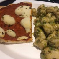 Pizza and gnocchi. Get there early so it's fresh...they heat in a microwave later.  at Giumella in Florence