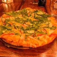 Veggie pizza with vegan cheese at La Traviata in Puerto Vallarta