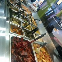 Buffet entrees and sides, BarBQ tofu, Ginger tofu in front at NuVegan in College Park