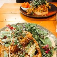 Scrambled tofu, mush, spinach and tomato AND the smashed avo and vegan feta.  at Waratah Organics in Upper Ferntree Gully