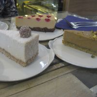 Cakes (raffaelo at the front, white chocolate and raspberry at the back) at Sweet Secret of Raw in Prague