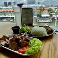 Rendang rice and burdock spring rolls  at nomVnom Bistro - Clarke Quay in Central Singapore