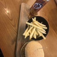 Burger and chips  at nomVnom Bistro - Clarke Quay in Central Singapore