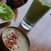 Iced matcha latte, Mixed sweet potato fries and Soy avocado smoothie bowl at nomVnom Bistro - Clarke Quay in Central Singapore