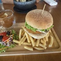 Lion’s Mane Burger with fries, salad and lemon passion fruit tea  at nomVnom Bistro - Clarke Quay in Central Singapore