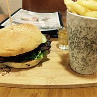 Temptation Satay burger, fries and complimentary apple vinegar drink at nomVnom Bistro - Clarke Quay in Central Singapore
