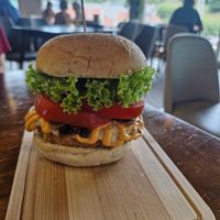Lion's Xtreme burger: Signature lion's mane mushroom patty, truffle mayo, sauteed button mushrooms, vegan cheese, fresh tomatoes at nomVnom Bistro - Clarke Quay in Central Singapore