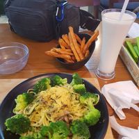 Spinach Linguine... A bit salty and peppery. Add broccoli for $1.50. Sweet potatoes fries are hot and crispy. Unsweetened soy milk.... Just about to hit $20 at nomVnom Bistro - Clarke Quay in Central Singapore