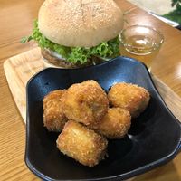 Burger and banana fritters at nomVnom Bistro - Clarke Quay in Central Singapore