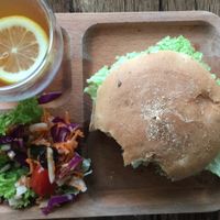 Nom burger (soy patty) with lemon& passion fruit tea at nomVnom Bistro - Clarke Quay in Central Singapore
