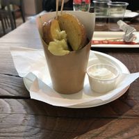 potato wedges, vegan cheese, lemon garlic sauce (delicious!!!) at Veg & Veg in Florence