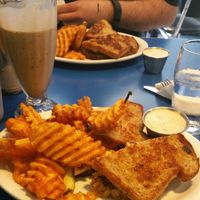 The Sheldon (vegan tofu reuben), seasoned waffle fries, vegan chocolate shake at Monty's Blue Plate Diner in Madison
