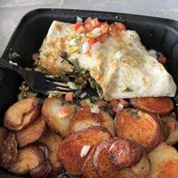 Partially eaten vegan burrito.   at Monty's Blue Plate Diner in Madison