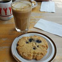 vegan blueberry lemon cookie, vanilla soy latte, delicious black coffee and vegan cherry danish (in background) at Mother Fool's Coffeehouse in Madison