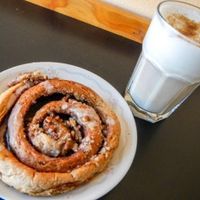 cinnamon roll and chai with vanilla soy milk at Mother Fool's Coffeehouse in Madison