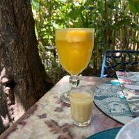 Maracujá juice with ginger and a shot of ginger mix( non alcohol)  at Vegan Vegan in Rio De Janeiro