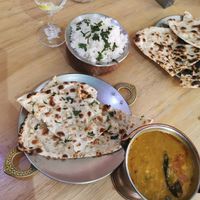 Yellow lentil curry and garlic naan at India Town in Mexico City