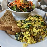 Breakfast scramble with side salad + toast with accidentally vegan margarine   at Busboys and Poets - Carroll St in Washington